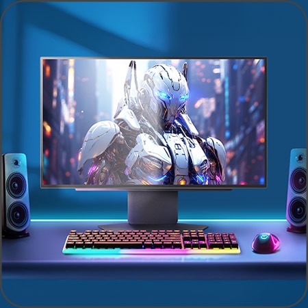 Configuración gamer con monitor brillante y teclado RGB, destacando iluminación Hexaglow sin marco.